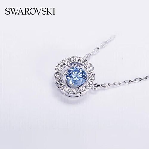 Set de collar y aretes SWAROVSKI  de cristal azul