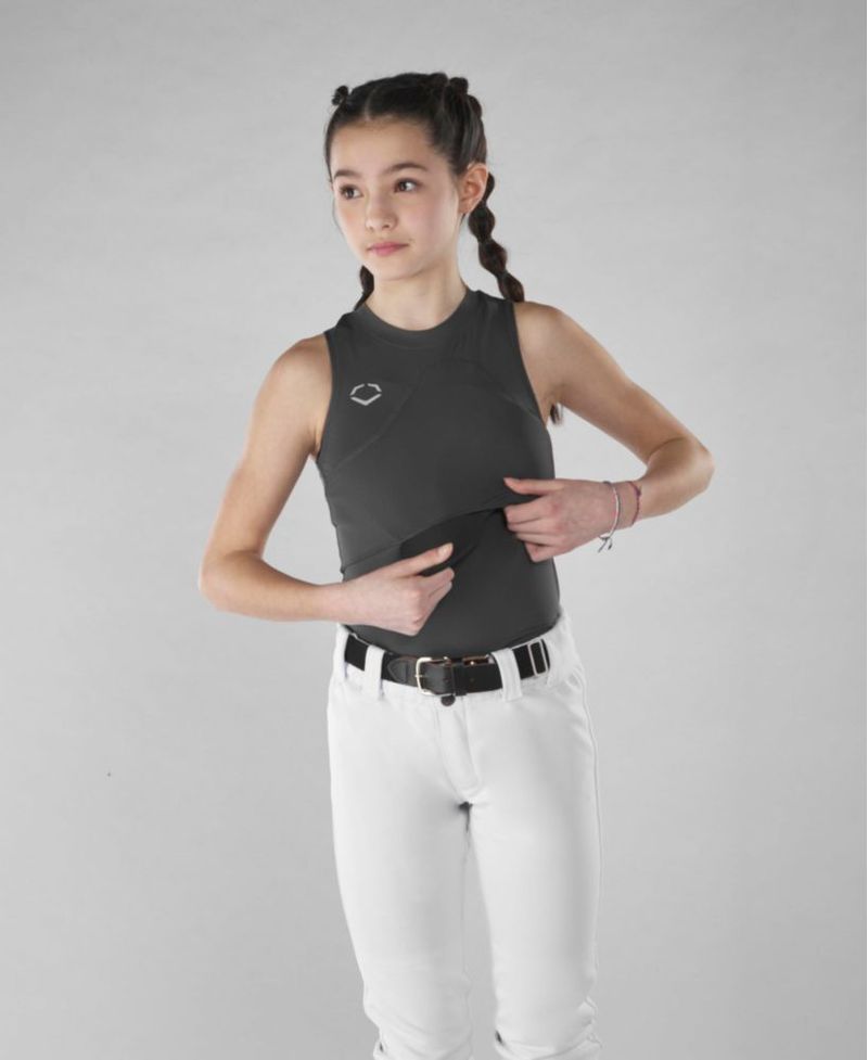 Camiseta EvoShield para niña con espalda cruzada gris talla juvenil mediana