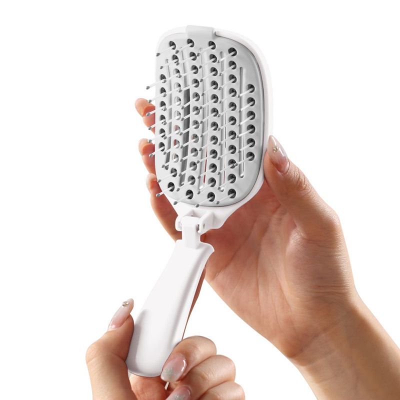 Cepillo de Pelo Plegable Rebex para Viaje con Autolimpieza