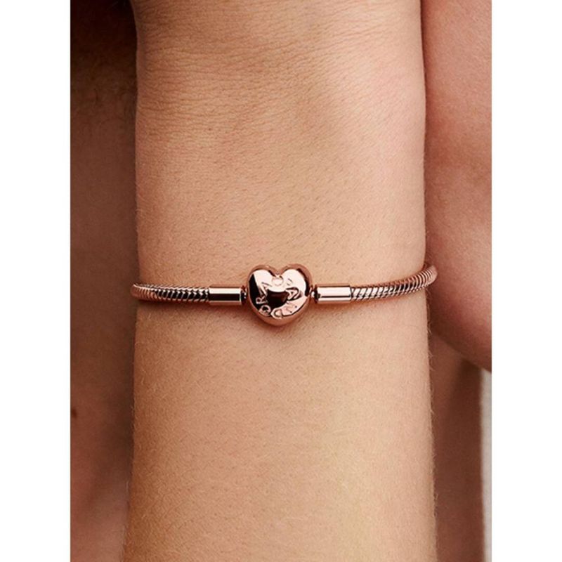 Pulsera PANDORA Moments 19 cm con cierre corazón en oro rosado