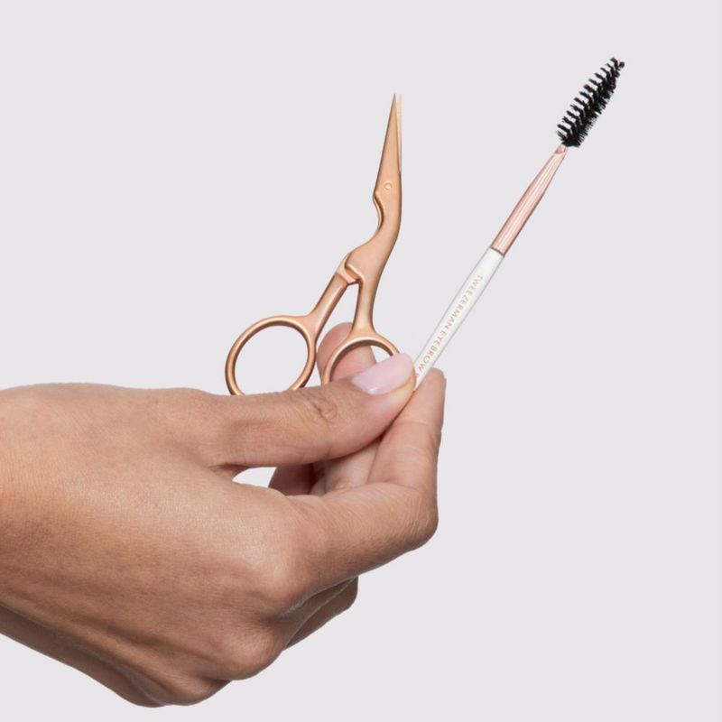 Tijeras y Cepillo para Cejas Tweezerman Oro Rosa