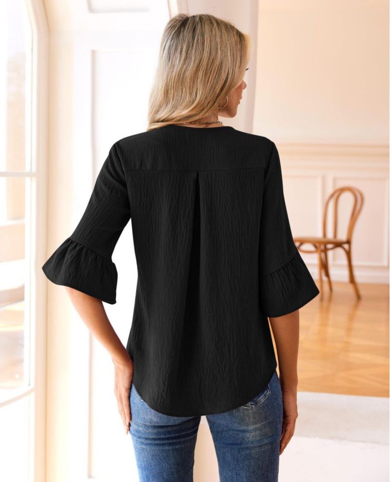 Blusa siliteelon de manga 3/4 con volantes color negro talla L