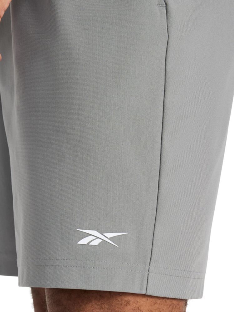 Shorts Reebok Jumpstart 20 cm Gris Talla Grande
