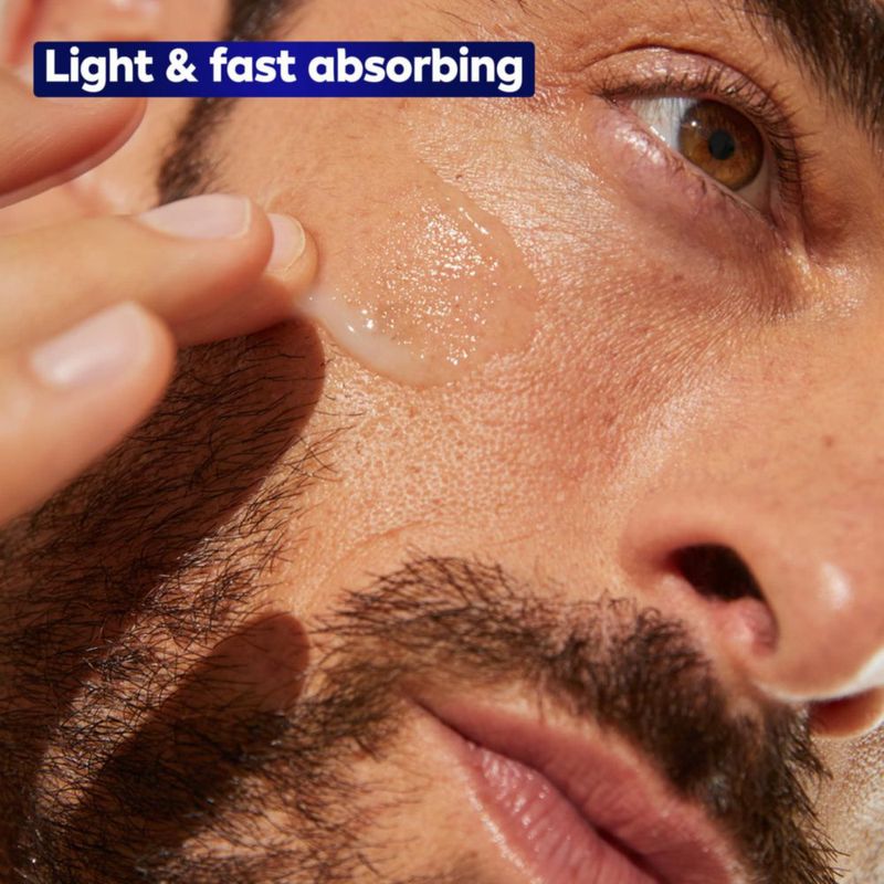Sérum facial NIVEA MEN Age Defense para manchas oscuras botella de 30 ml