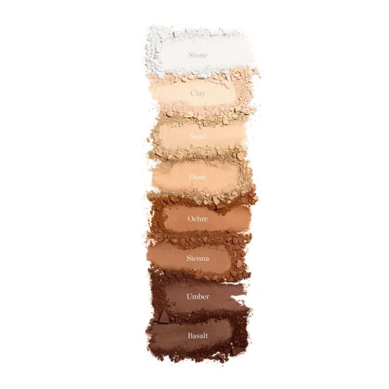 Polvo fijador de maquillaje en polvo esculpido en forma de ocre color ámbar
