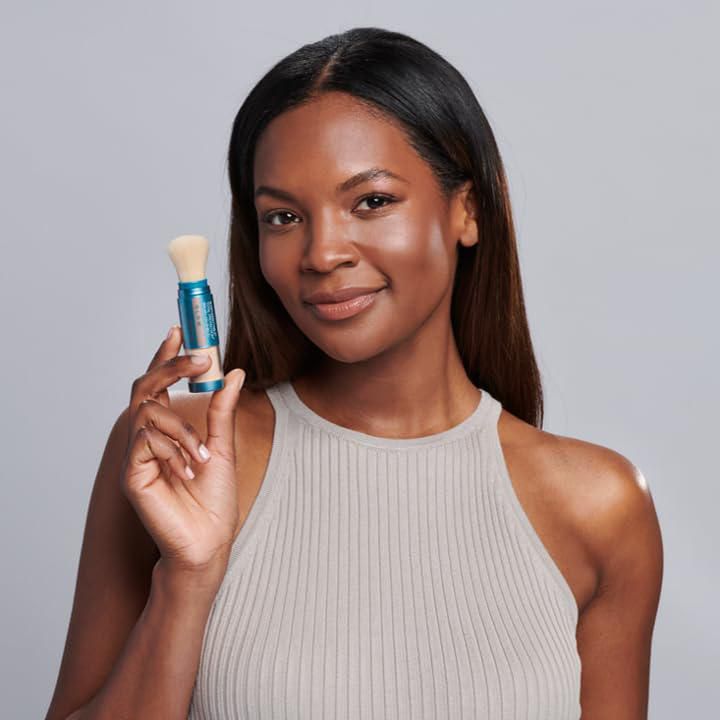Brocha de protección solar Colorescience Sunforgettable GLOW SPF 50