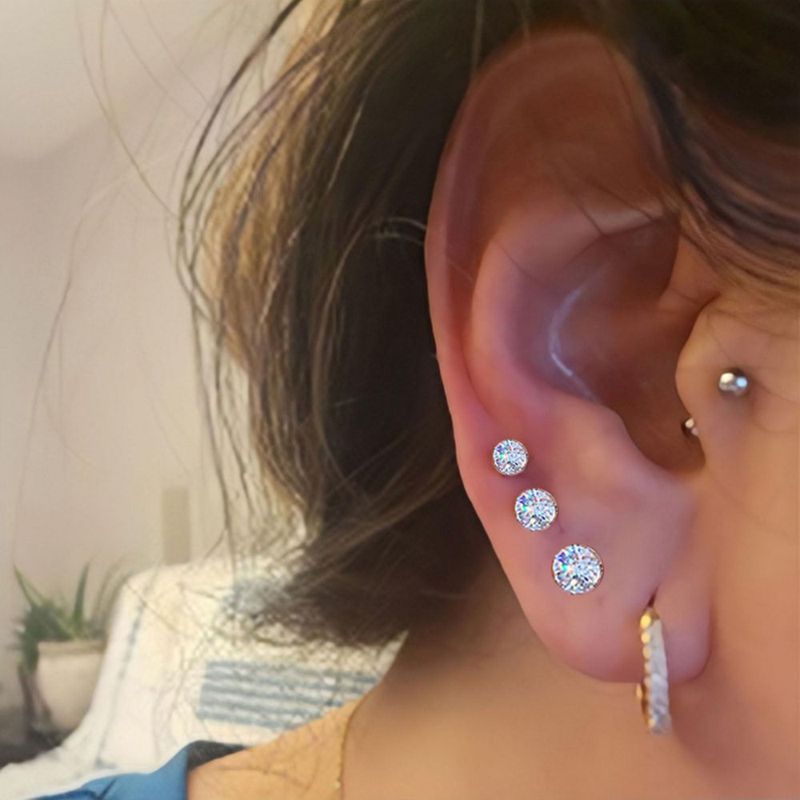 Pistola perforadora para orejas SLVIEKAE kit desechable con pendiente de circonita cúbica