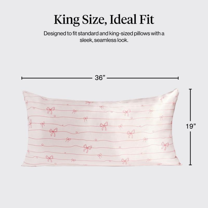 Funda de almohada Kitsch King a rayas con lazos satén con cremallera