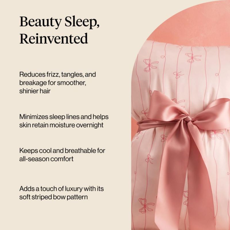 Funda de almohada Kitsch King a rayas con lazos satén con cremallera