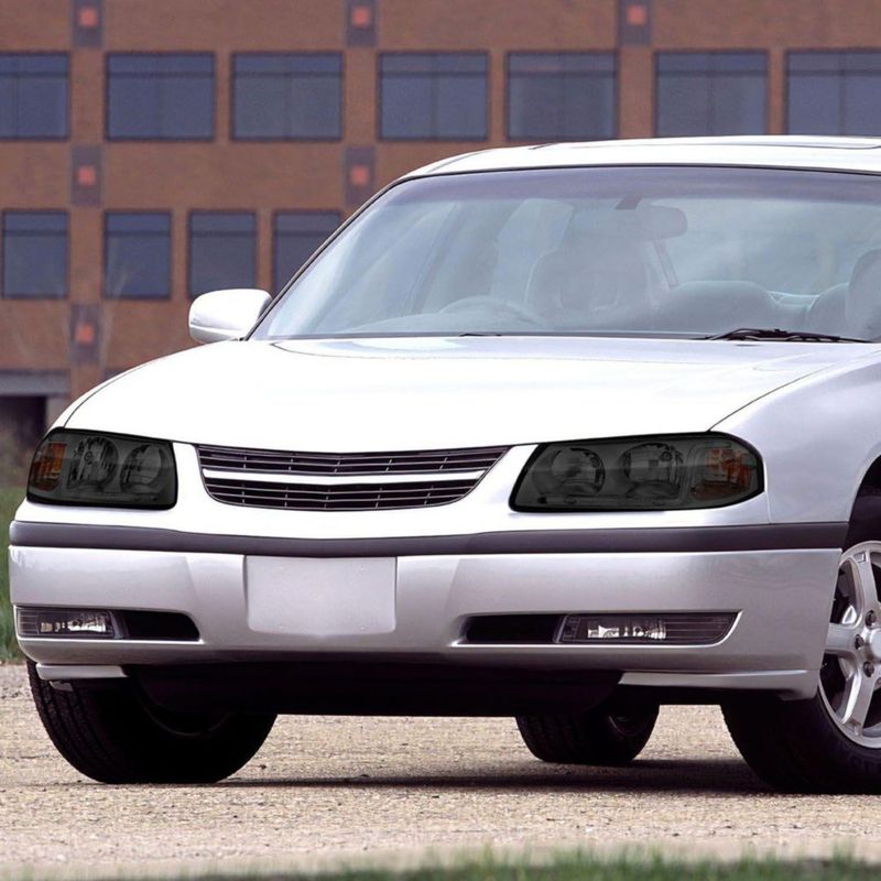 Faro delantero DNA MOTORING Chevrolet Impala 00‑05 Ahumado Transparente
