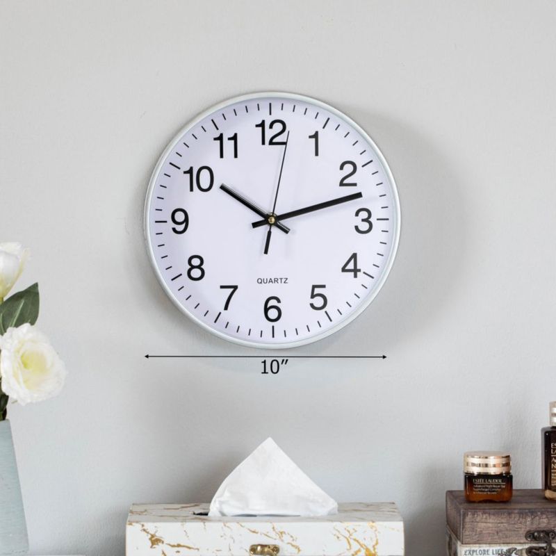 Reloj de pared CLOCKSWISE plateado analógico silencioso 25 cm