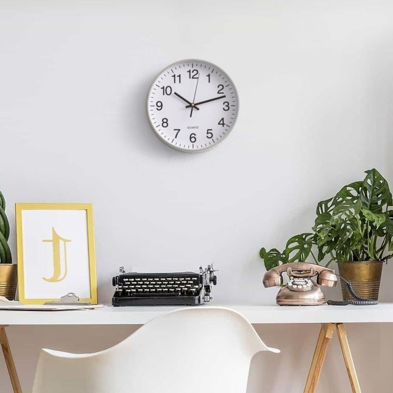 Reloj de pared CLOCKSWISE plateado analógico silencioso 25 cm
