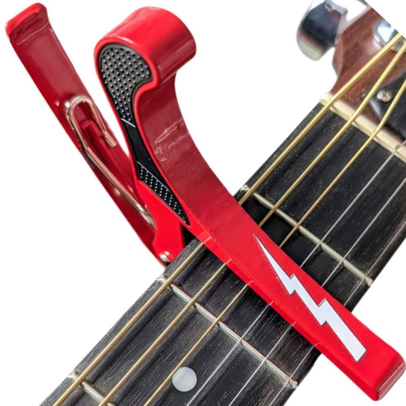 Capotraste Powered By Rock Rayo Rojo