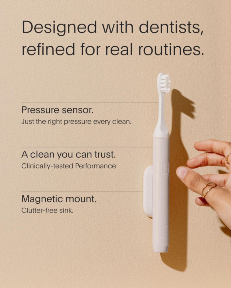 Cepillo de dientes eléctrico SURI Core Sonic gris con sensor de presión