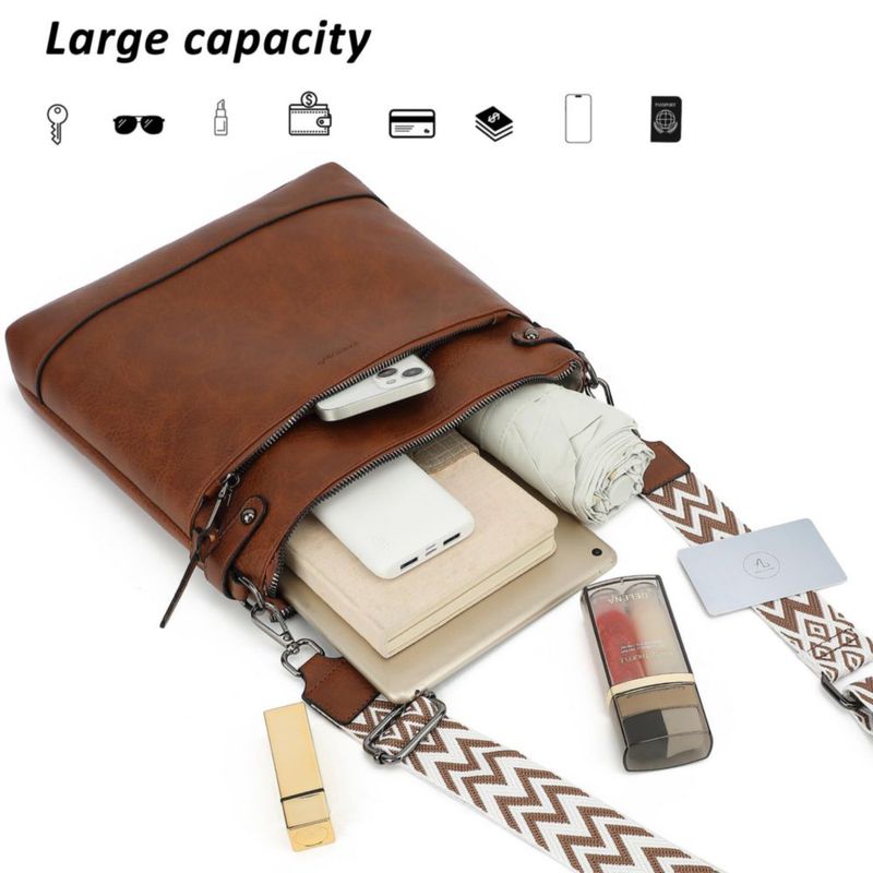 Bolso de mano TANTOMI de cuero vegano 32 cm con correa de guitarra
