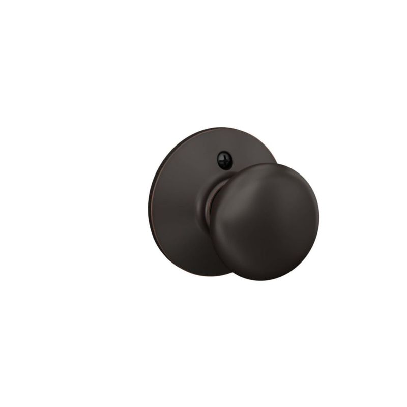 Pomo de puerta Schlage F170 PLY 716 bronce envejecido que no gira