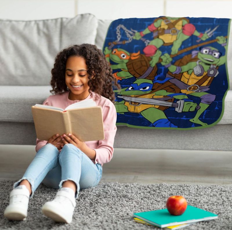 Manta decorativa Jay Franco 102 × 127 cm TMNT azul