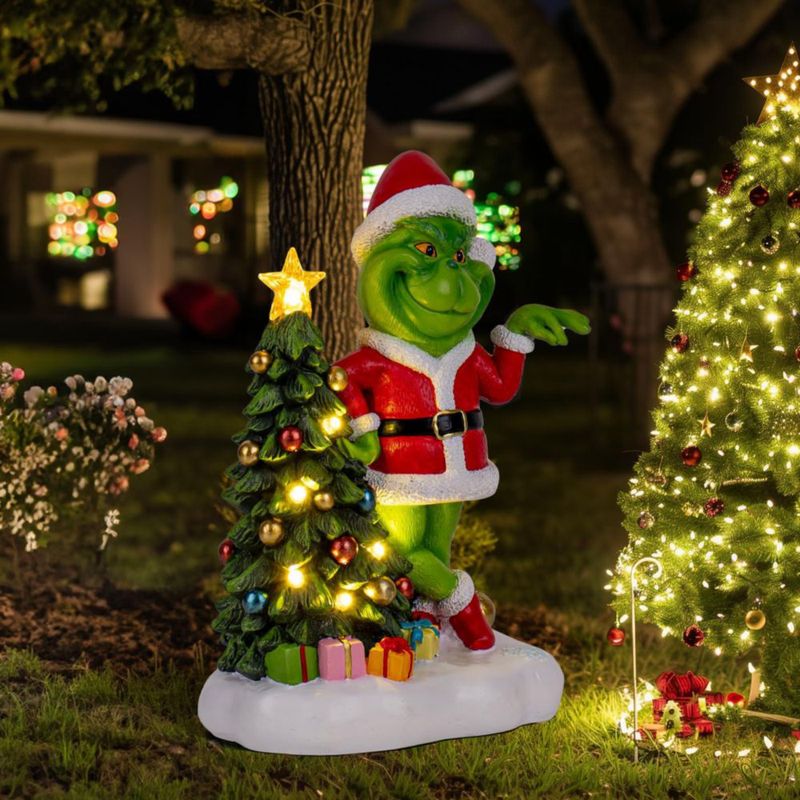 Estatua solar de jardín YDKOJGW monstruo verde con 6 luces LED