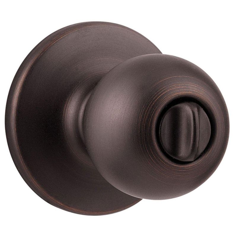 Perilla para dormitorio y baño Kwikset Polo en bronce veneciano