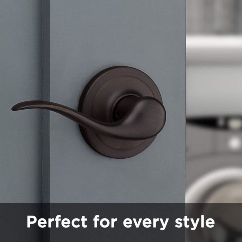 Manilla de puerta Kwikset Tustin Interior Passage Venetian Bronze