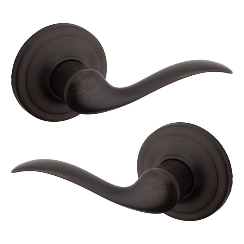 Manilla de puerta Kwikset Tustin Interior Passage Venetian Bronze