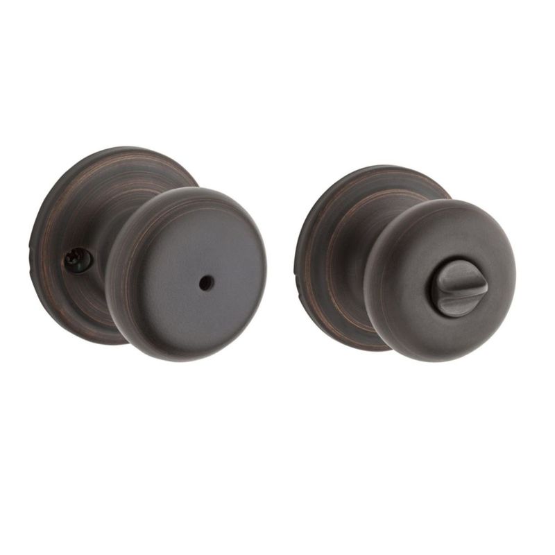 Pomo de puerta Kwikset Juno Interior Privacy con cerradura en bronce veneciano