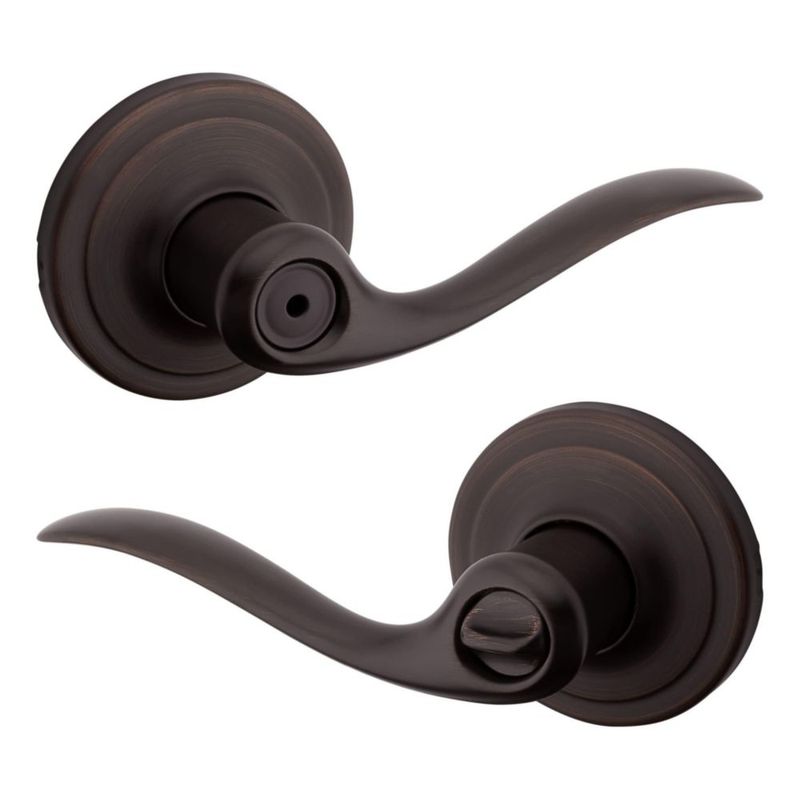 Manilla de puerta Kwikset Tustin Interior Privacy con cerradura en bronce