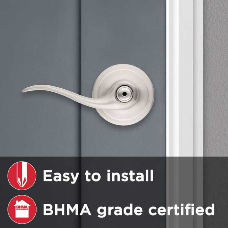 Manilla de puerta Kwikset Tustin Interior Privacy con cerradura en níquel satinado