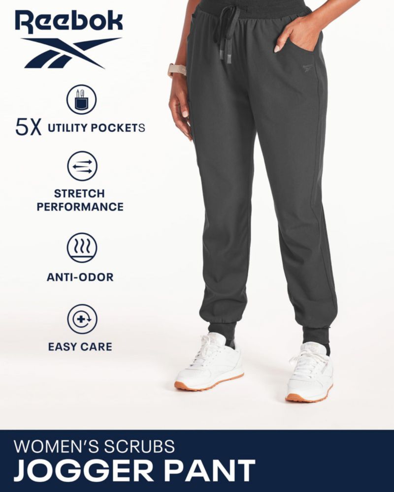 PANTALONES Reebok Mujer Scrub Jogger 5 Bolsillos Antiolor
