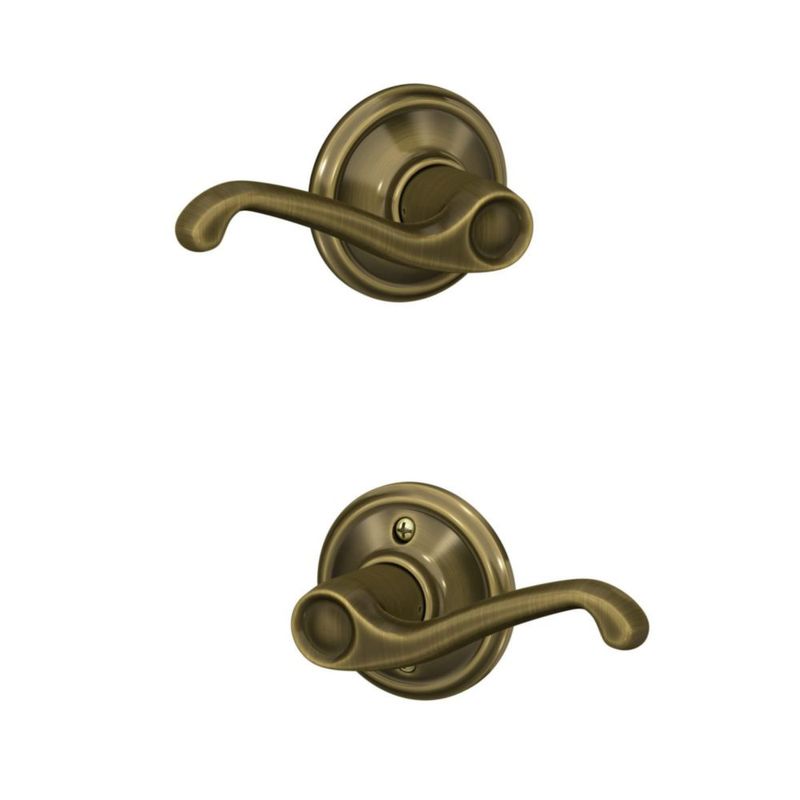 Palanca de puerta SCHLAGE F10 V FLA 609 Latón envejecido