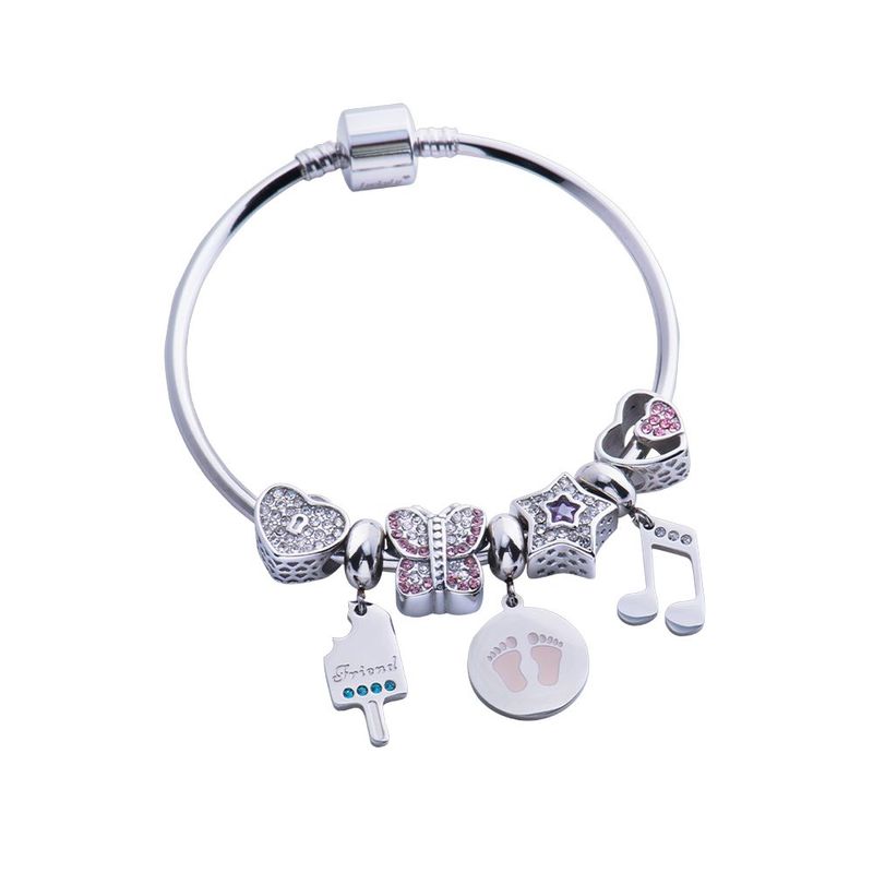 Charm luckyly baño oro rosa 18k acero inox de corazón y huellas dora plateado