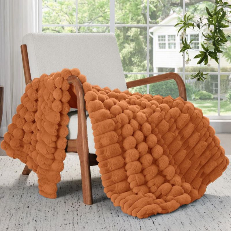 Manta BEDELITE 152x127 cm de felpa sintética a rayas en naranja quemado