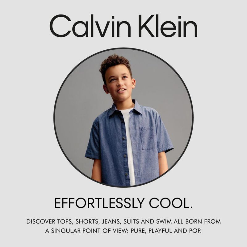 Polo Calvin Klein 10-12 azul insignia de algodón