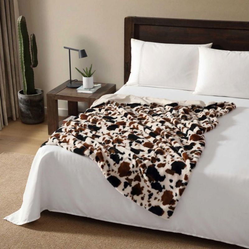 Manta Wrangler reversible 132 × 178 cm de pelaje sintético