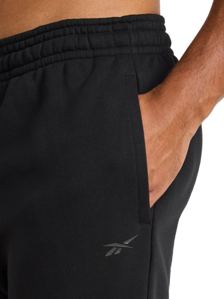PANTALONES Reebok Motion Core Fleece 76 cm Negro Talla S