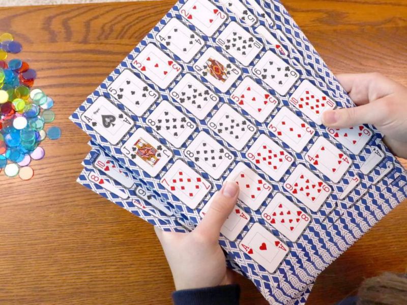 Juego de cartas Regal Games Poker Keeno con 12 tableros y 200 fichas