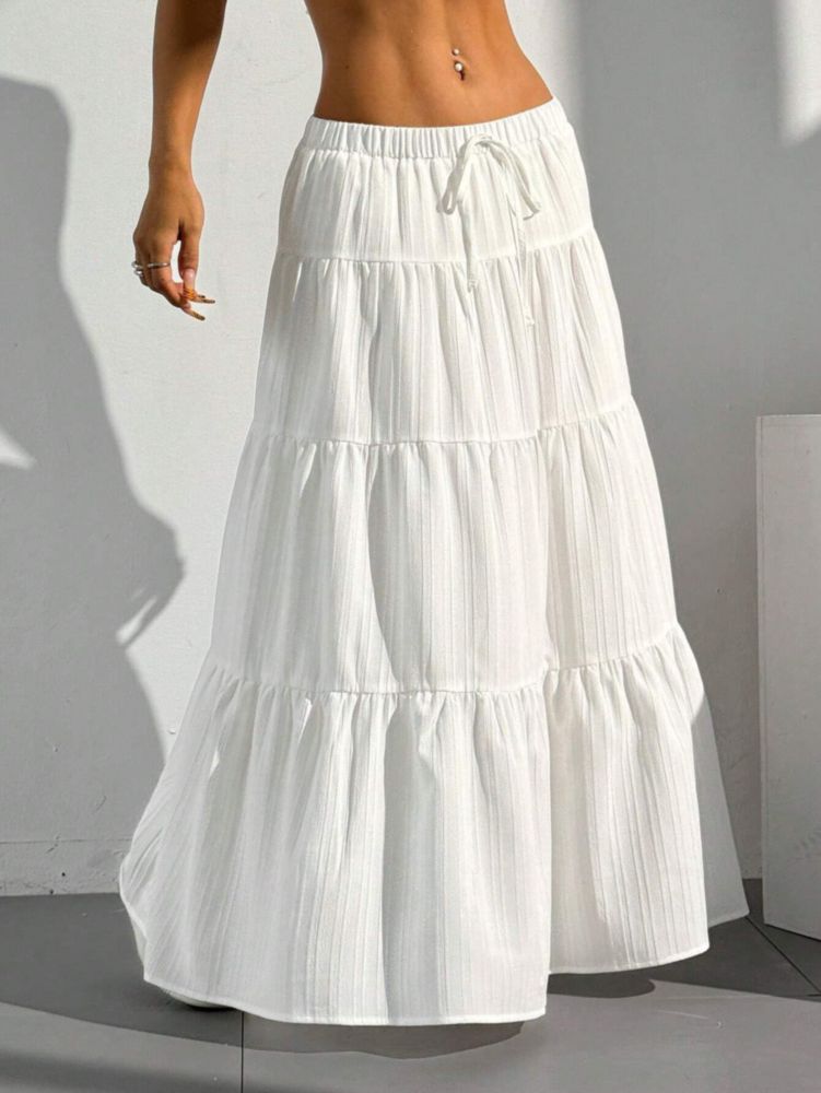 Falda Xuani blanca maxi boho fluida con volantes y cintura alta