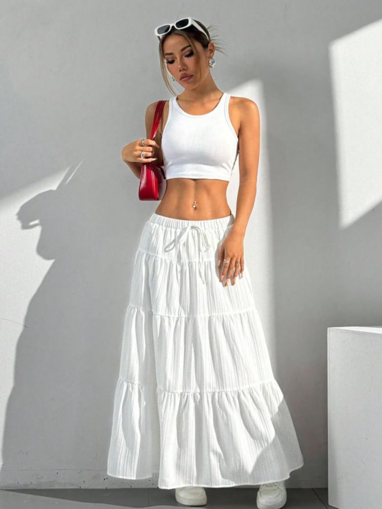 Falda Xuani blanca maxi boho fluida con volantes y cintura alta