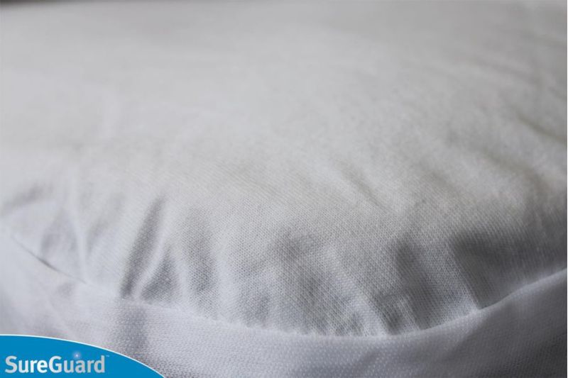 Protector de colchón impermeable SureGuard Mini Cuna 69 cm