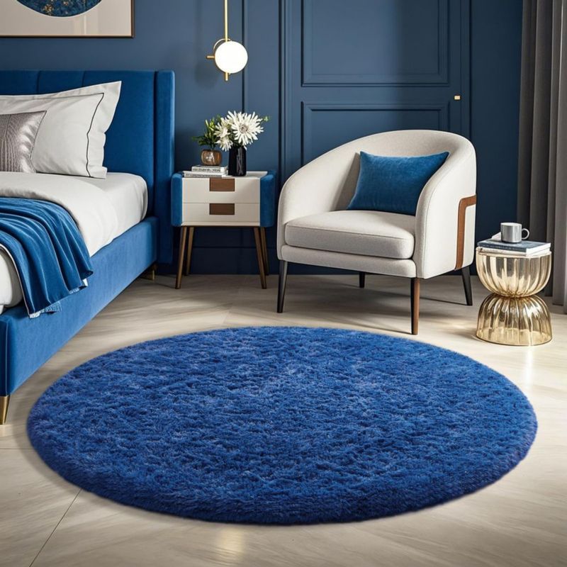 Alfombra redonda Ophanie 122 cm azul de pelo largo y esponjosa