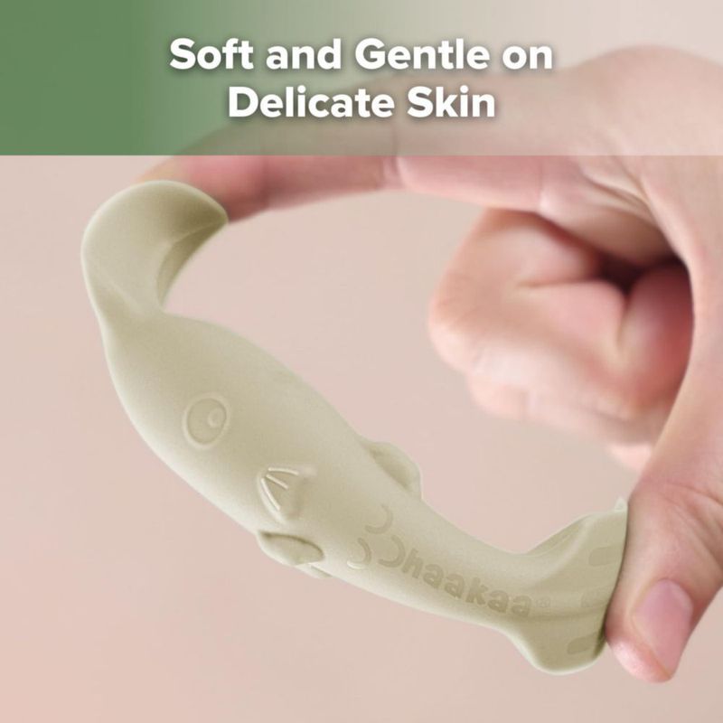 Espátula de silicona beige haakaa para pañales con estuche