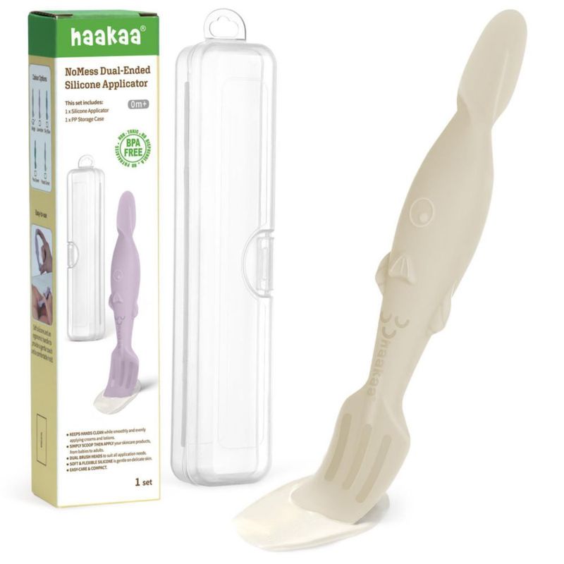 Espátula de silicona beige haakaa para pañales con estuche