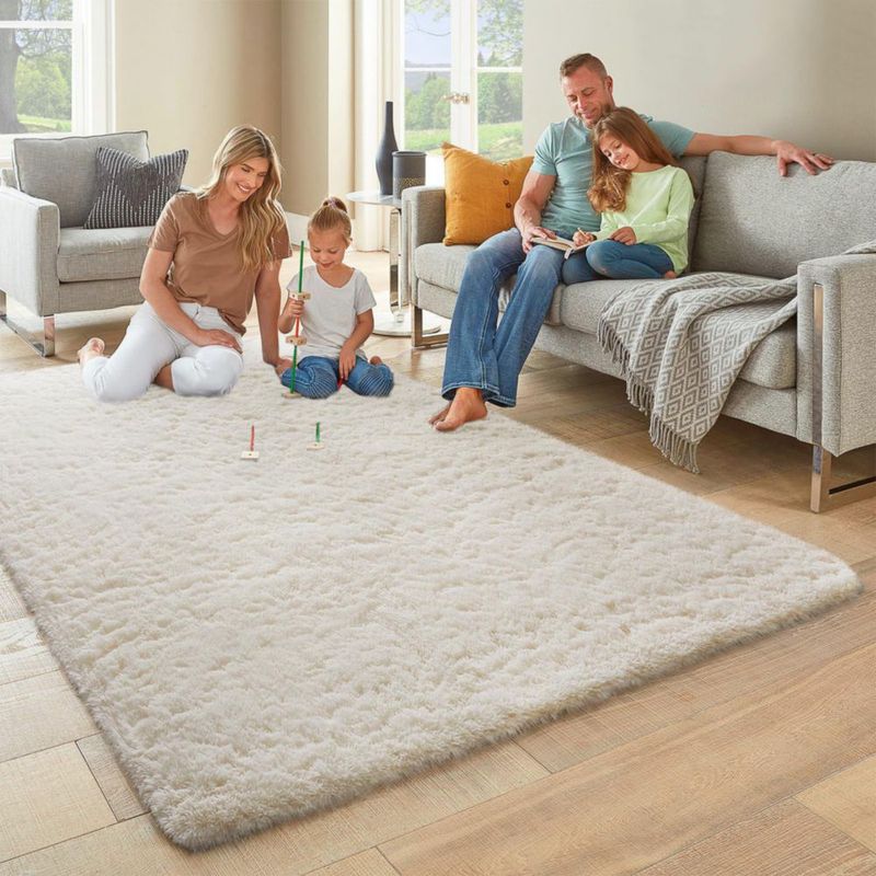Alfombra de área Ophanie 183 x 274 cm marfil suave y antideslizante