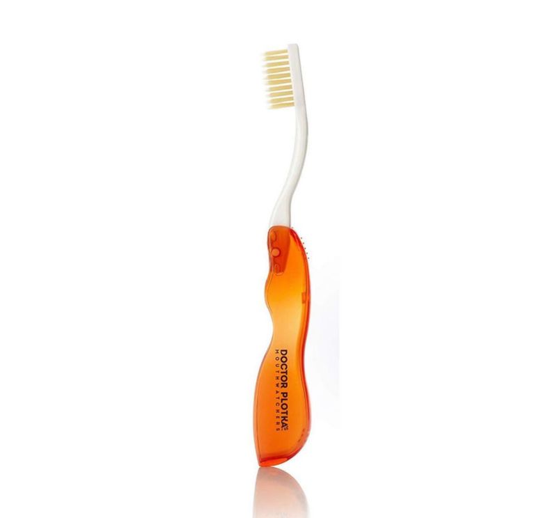 Cepillo de Dientes Plegable MOUTHWATCHERS Suave con Hilo Dental Rojo