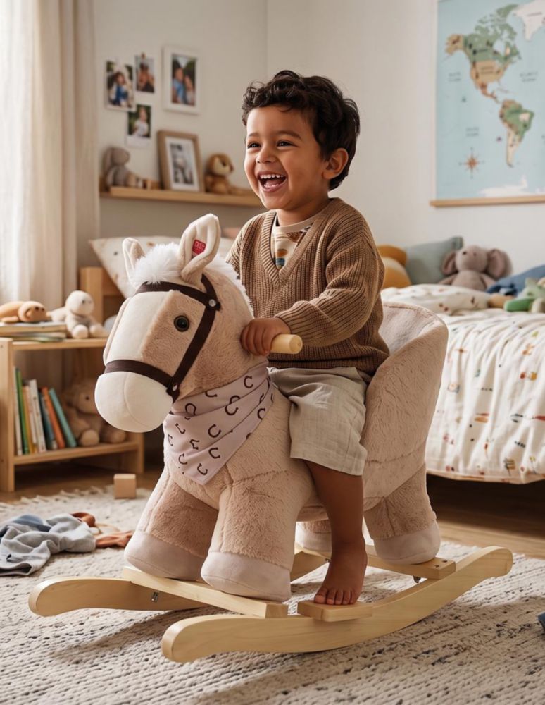 CABALLO BALANCÍN TOFFEE MARRÓN. MECEDOR DE PELUCHE CON SONIDO DE RELINCHIDO, ASIENTO PREVENTIVO REFORZADO Y BASE DE MADERA. SOPORTA HASTA 30 KG